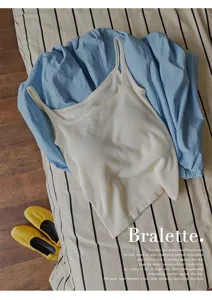 Detail shot of the seamless ribbed thermal camisole featuring a square neck and fleece lining.