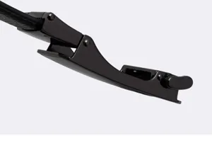Detailed close-up of a sleek black alloy automatic belt buckle showcasing fine metal finish.
