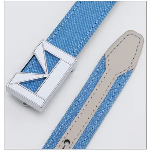 Blue denim women belt with geometric metal buckle, casual retro style fashion waist accessory.