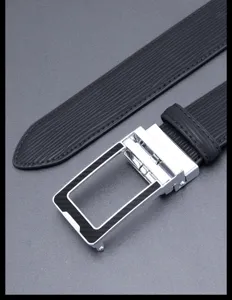 Men's leather belt automatic metal buckle business casual fashion detail closeup view