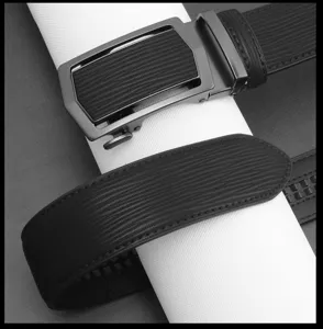 Men's leather belt detail showing the stylish automatic metal buckle and textured black strap.