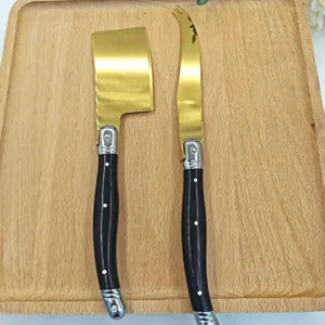 Juego de cuchillos para mantequilla dorados y espatula de queso con mango negro ideal