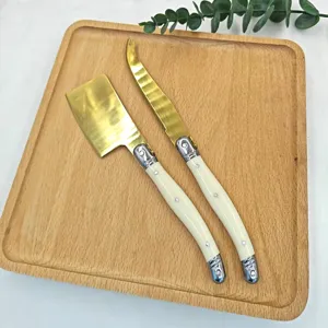 Set de cuchillos para queso y espatula de mantequilla de acero inoxidable con mango color marfil