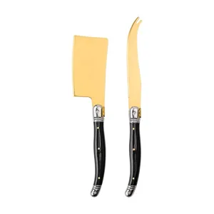 Set de cuchillos para queso de acero con mango negro y hoja dorada para cortar mantequilla.