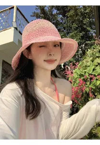 Pink straw bucket hat for women, wide brim sun hat, sweet style beach vacation hat.