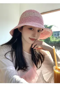 Pink straw bucket hat for women, wide brim sun protection hat for summer beach vacation.