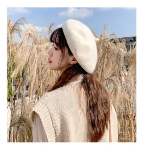 Chic beige beret detail shot, cozy knit winter hat for women, vintage Japanese style fashion accessory.