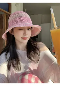 Pink straw bucket hat for women, wide brim woven sun hat for beach vacation and spring daily wear.