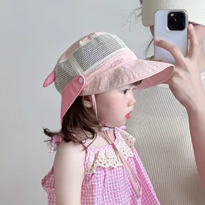 Detailed view of cute baby sun hat with breathable mesh and neck flap for summer outdoor wear.