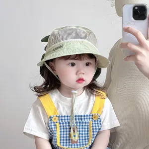 Cute breathable mesh baby sun hat with dinosaur design, perfect for summer outdoor toddler wear.