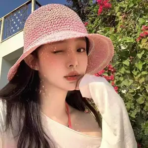 Pink straw bucket hat for women, wide brim sun protection hat for summer beach vacation.