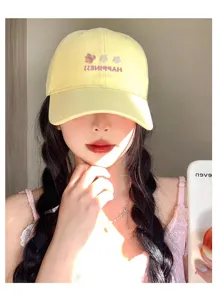 Milky yellow embroidered baseball cap for women, cute floral summer sun protection hat.