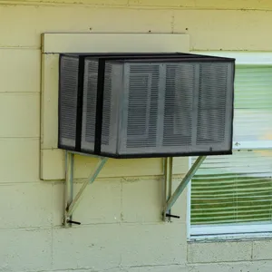 Outdoor window air conditioner mesh cover detail showing durable black fabric on wall bracket.