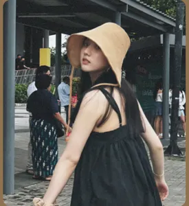 Stylish cotton linen sun hat with wide brim, breathable and versatile for summer daily wear.