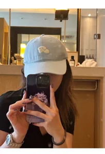 Light blue embroidered baseball cap, casual curved brim sun protection hat for women.