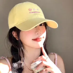 Cute light yellow baseball cap for women, embroidered floral design, summer sun protection.