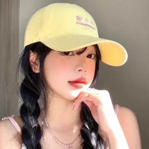 Milky yellow embroidered baseball cap for women, cute floral summer sun protection hat.