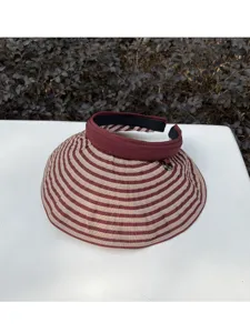 Elegante cappello parasole a righe con tesa larga per donne protezione solare estiva all'aperto.