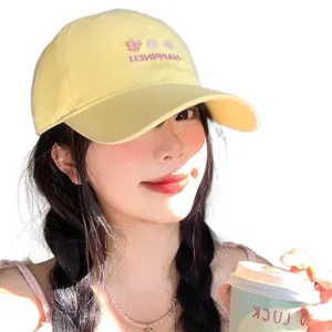 Milky yellow embroidered baseball cap for women, cute floral summer sun protection hat.