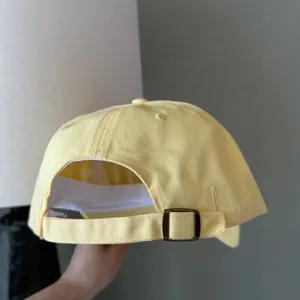 Light yellow cotton baseball cap for women, adjustable metal buckle strap, summer sun hat.