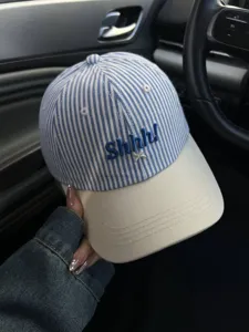 Striped embroidered baseball cap for women, cute Shhh letter design, casual sun protection.