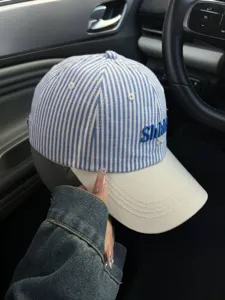 Korean style striped baseball cap for women with blue and beige curved brim sun hat.
