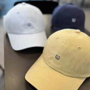 Minimalist cat embroidered baseball hat detail showing versatile Korean style sunshade cap.