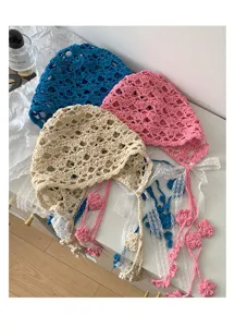 Hollow crochet lace bonnet hat with floral tassel ties, cute aesthetic vintage knit cap.