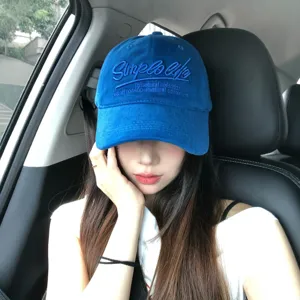Retro blue baseball cap with letter embroidery, wide brim Korean sun hat for women.