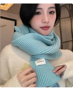 Korean style light blue knitted thick warm winter scarf detail shot for cozy daily wear.