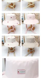 Joli chapeaubob à imprimé cerise et uni avec liens à nouer pour protection solaire d'été femme.