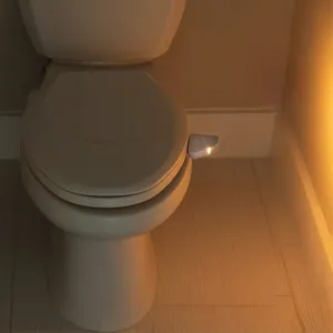 Primer plano de la luz nocturna de inodoro con sensor de movimiento y brillo cálido.