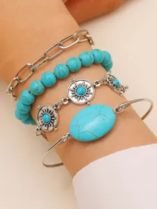 Bohemian turquoise layered bracelet set for women, vintage silver chain and stone bangle cuff.