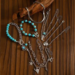 Bohemian turquoise multi-layer charm bracelet set with star and metal skull pendants for women.