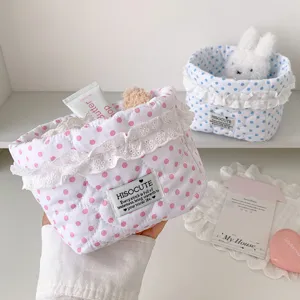 Korean style polka dot lace fabric storage basket for cute desktop cosmetic organization.