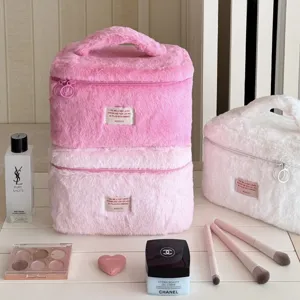 Cute plush cosmetic bag with large capacity, soft furry travel toiletry storage pouch for women.