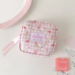 Korean plaid tulip quilted cosmetic pouch with bow ribbon for small storage items.