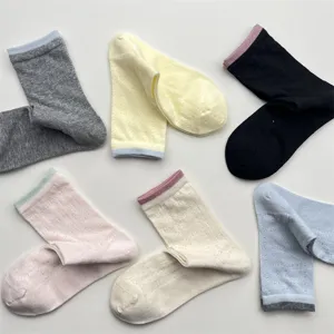 Japanese vintage mesh hollow breathable mid-calf socks for women spring summer casual wear.