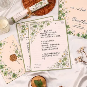 Charming green fresh stationery set with clover letter writing paper and envelopes for gift.