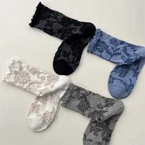 Vintage floral lettuce trim mid-tube socks for women, elegant textured cotton hosiery.