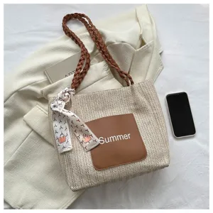 Woven straw shoulder tote bag for women, large capacity casual handbag with stylish design.