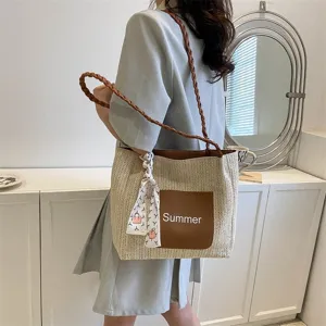 Large capacity straw woven shoulder tote bag for women, casual spring fashion handbag with ribbon.