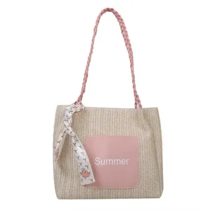 Woven straw tote bag for women, large capacity casual shoulder bag with pink strap.