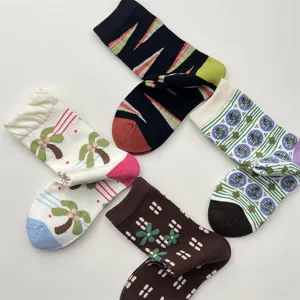 Cotton mid-tube socks with assorted vibrant patterns, comfortable daily casual wear for women.