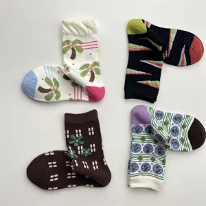 Korean style colorful patterned cotton mid-calf socks featuring cute plant and geometric designs.