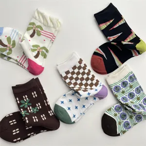 Close-up of stylish Korean-style patterned cotton crew socks featuring diverse colorful prints.