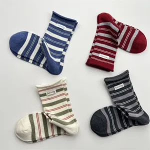 Korean style vintage striped mid-calf socks for women, comfortable cotton knit casual hosiery.