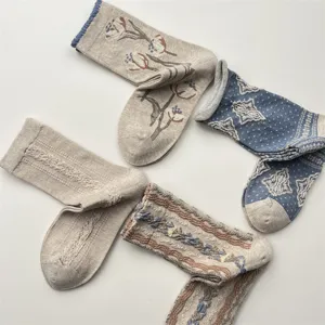 Japanese vintage style women mid-tube cotton socks with cute floral diamond knit patterns.
