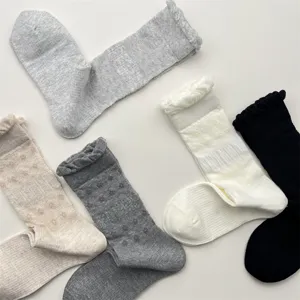 Detailed view of women casual solid color mesh stacking socks with bubble lace and breathable design.