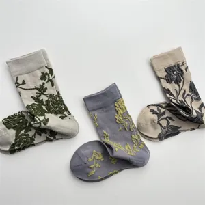Chaussettes mi-tubes en coton à motifs botaniques vintage, design floral rétro respirant.
